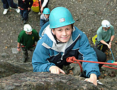 Boy climbing with call of the Wild in Brecon Beacons Wales